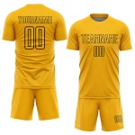 Camiseta de fútbol personalizada con sublimación de formas geométricas en dorado y negro Camiseta de fútbol personalizada con sublimación de formas geométricas en dorado y negro