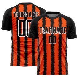 Camiseta de fútbol personalizada con sublimación de líneas negras, naranjas y blancas Camiseta de fútbol personalizada con sublimación de líneas negras, naranjas y blancas