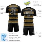 Camiseta de fútbol personalizada con sublimación de líneas y formas geométricas en negro, dorado antiguo y blanco Camiseta de fútbol personalizada con sublimación de líneas y formas geométricas en negro, dorado antiguo y blanco